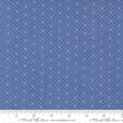 The image is a close-up of a fabric with a blue background and white dots or stars arranged in a pattern.