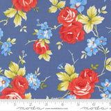 a fabric with a floral pattern of red roses and blue flowers against a blue background.