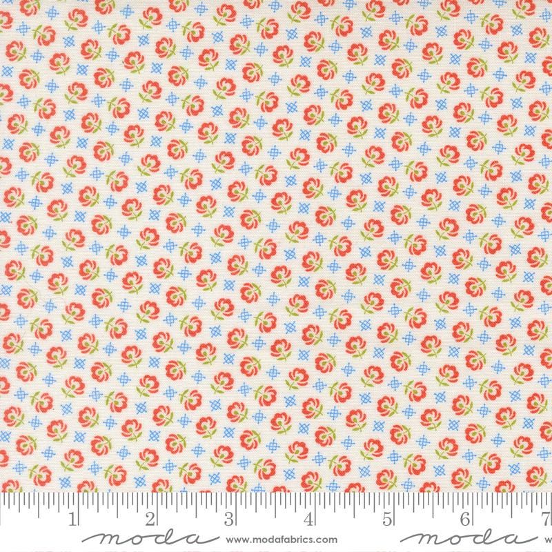 a fabric with a repeating pattern of red flowers and blue flowers. The pattern is arranged in a diagonal grid-like design, creating a visually appealing and intricate design.