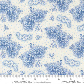 a repeating pattern of blue flowers and leaves on a light background.