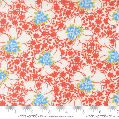 The image is a fabric with a floral pattern in shades of red, white, and blue. The pattern consists of various flowers and leaves, creating a visually appealing and vibrant design.