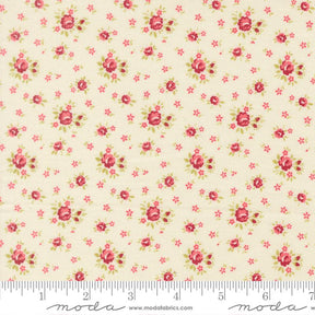 a fabric with a floral pattern of red and green flowers.