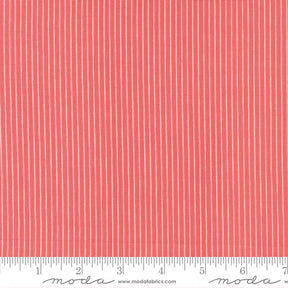The image is a close-up of a fabric with vertical red stripes.