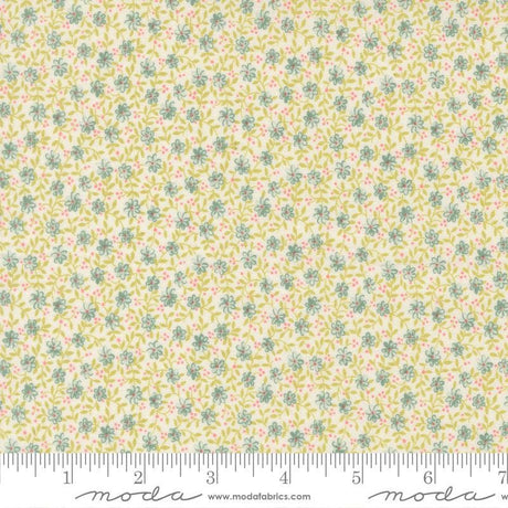The image is a fabric with a floral pattern in shades of yellow and green.