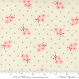 a fabric with a floral pattern and polka dot design.