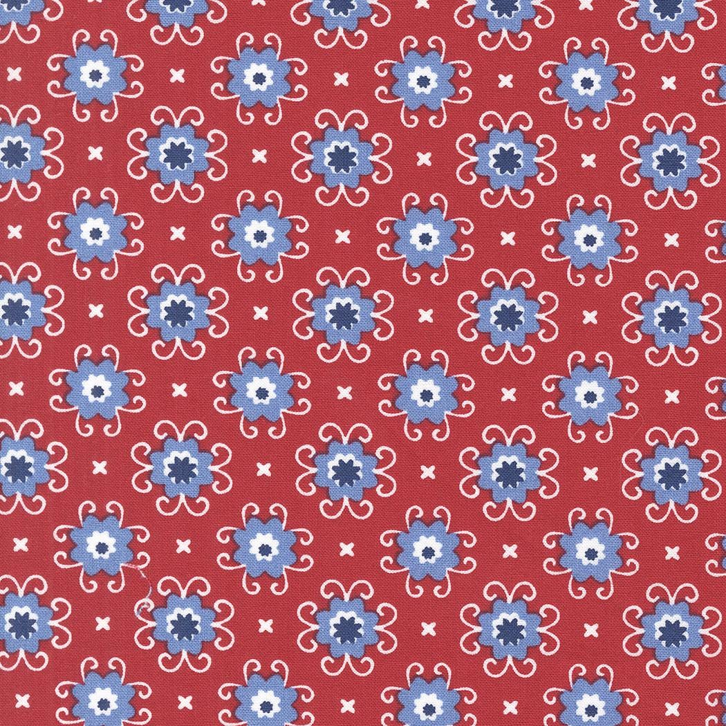 a repeating pattern of blue and white flowers on a red background.