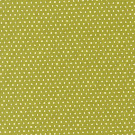 a repeating pattern of green polka dots on a light green background.