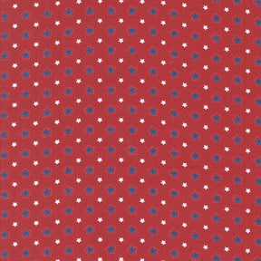 a red background with white stars scattered across it.