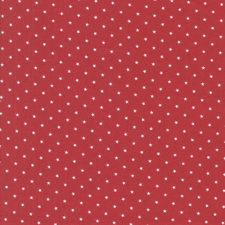 a red background with white stars scattered across it.