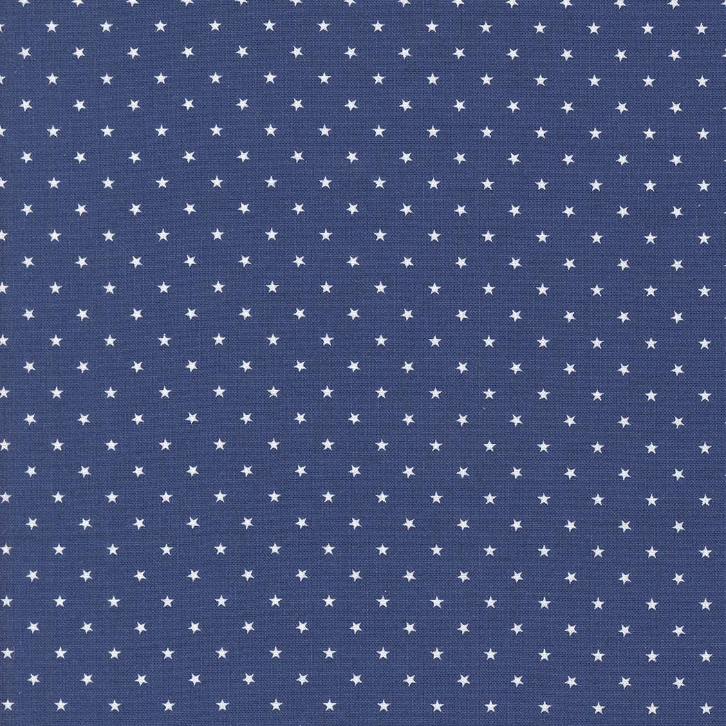 a pattern of small white stars against a dark blue background.