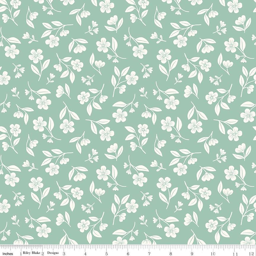 a repeating pattern of white flowers and leaves on a light green background.