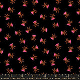 a repeating pattern of pink flowers against a black background.