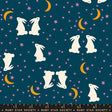 The image is a pattern featuring white rabbits against a dark blue background with stars and crescent moons.