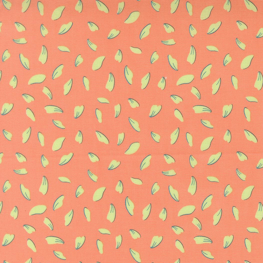 a repeating pattern of yellow and green leaf shapes on a peach-colored background.