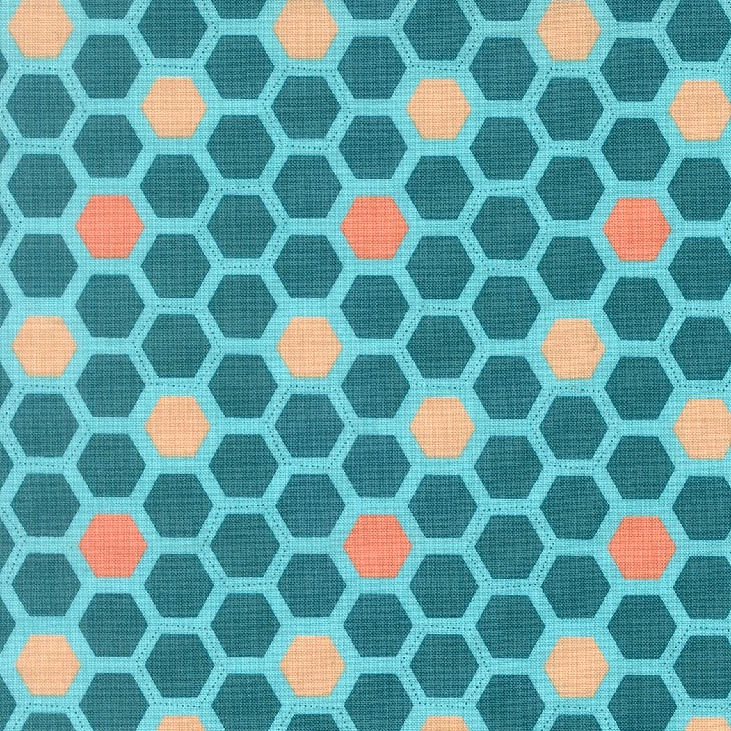 a repeating pattern of hexagons in shades of blue and orange, creating a visually striking and geometric design.