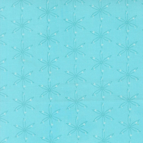 a repeating pattern of white star-like designs on a light blue background.
