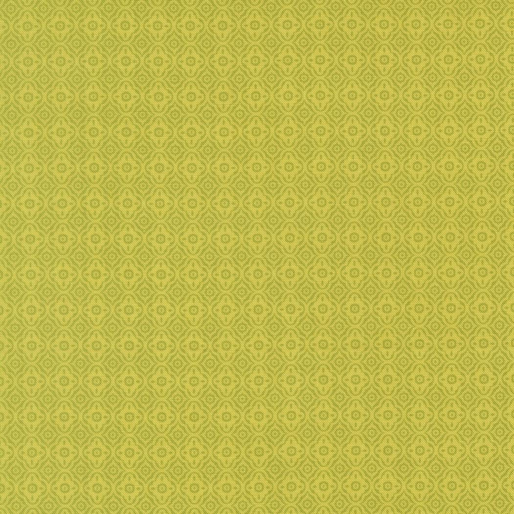 a repeating pattern of green and yellow diamond shapes, creating a visually striking and symmetrical design.