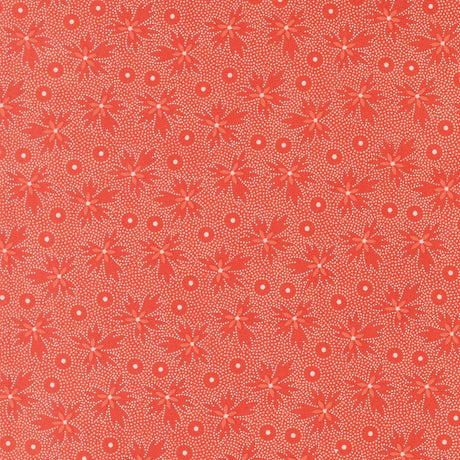 a repeating pattern of red flowers with white dots on a red background.