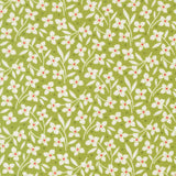 a repeating pattern of white flowers with red centers against a green background.