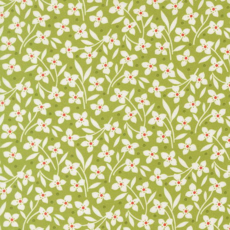 a repeating pattern of white flowers with red centers against a green background.