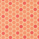 a repeating pattern of hexagons in shades of orange and red, creating a visually striking and geometric design.