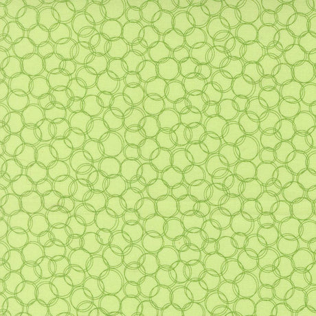 a repeating pattern of green circles on a light green background.