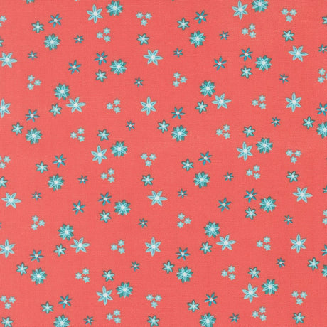 a pattern of small blue and white flowers scattered across a bright red background.