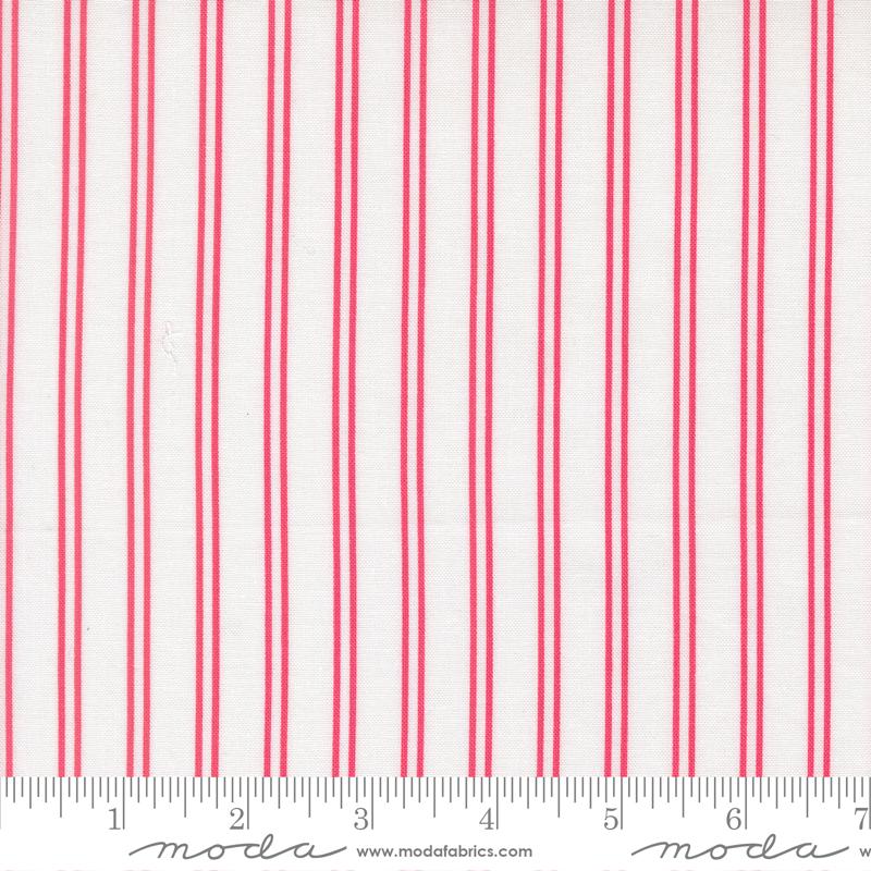 The image is a close-up of a fabric with vertical red and white stripes.