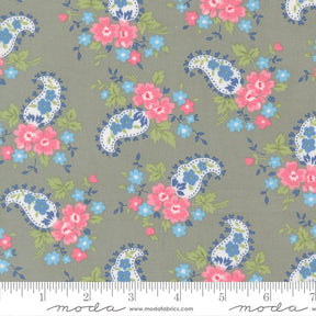 a repeating pattern of paisley designs with pink and blue flowers on a grey background.