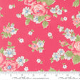 a vibrant pink fabric adorned with a floral pattern of white and pink flowers, along with green leaves. The fabric appears to be a part of a larger textile or garment, as indicated by the ruler for scale.