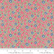The image is a fabric with a floral pattern in shades of pink, blue, and green. The pattern consists of small flowers and leaves scattered across the fabric, creating a visually appealing and colorful design.