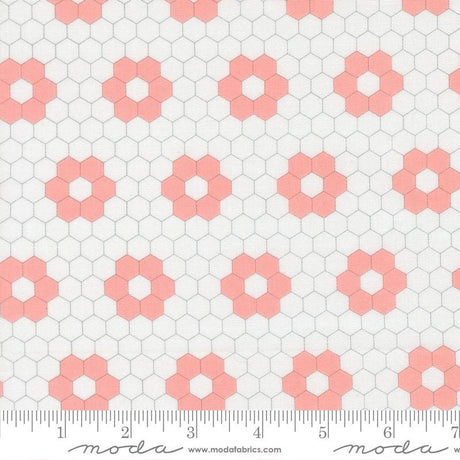a repeating pattern of pink hexagons on a white background.