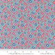The image is a fabric with a floral pattern in shades of blue and red. The pattern consists of small flowers and leaves scattered across the fabric, creating a vibrant and colorful design.