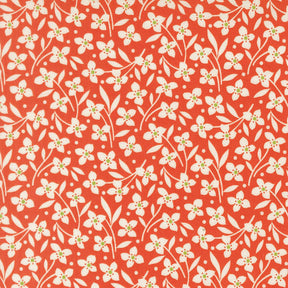 a repeating pattern of white flowers with green centers against a red background.