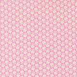 a repeating pattern of white flowers on a pink background.