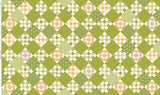 The image is a collage of various geometric patterns and shapes, including squares, rectangles, and diamonds, arranged in a repeating pattern. The colors used are green, orange, and white, creating a visually striking and vibrant design.