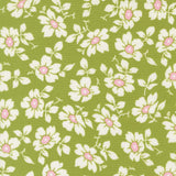 a repeating pattern of white flowers with pink centers against a green background.