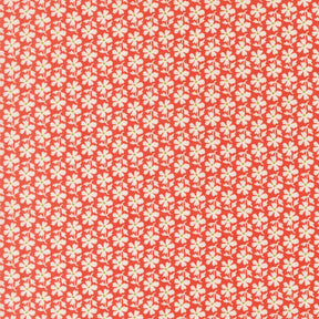 a repeating pattern of red flowers with white centers, creating a visually striking and symmetrical design.