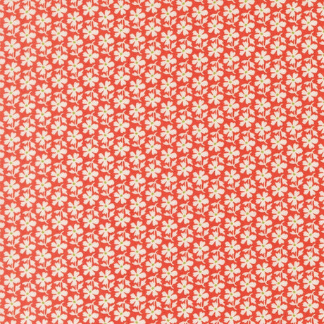 a repeating pattern of red flowers with white centers, creating a visually striking and symmetrical design.