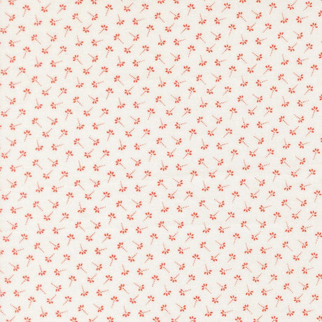 a repeating pattern of small red flowers or leaves on a light-colored background.