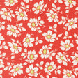 a repeating pattern of white flowers with green centers against a red background.