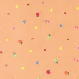 a pattern of various fruits, including apples, oranges, and cherries, scattered across a peach-colored background.