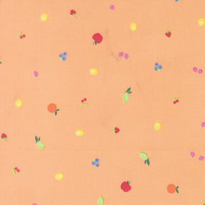 a pattern of various fruits, including apples, oranges, and cherries, scattered across a peach-colored background.