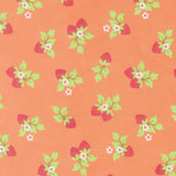 a repeating pattern of pink and green flowers and leaves on an orange background.