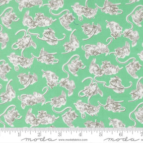 a repeating pattern of gray cats on a green background.