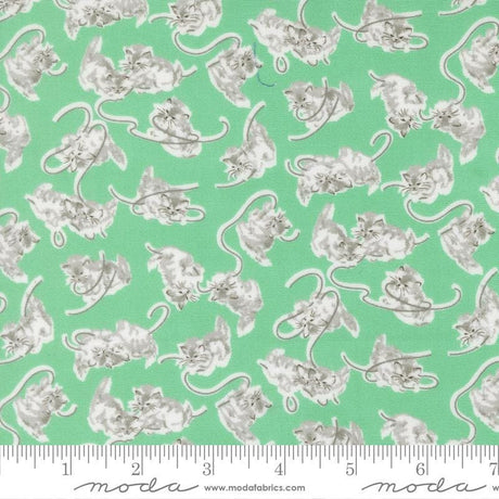 a repeating pattern of gray cats on a green background.