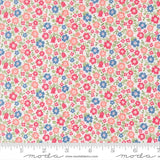 a fabric with a floral pattern in shades of pink, blue, and green. The fabric appears to be a light-colored material, possibly cotton or linen, with a repeating pattern of small flowers and leaves. The image does not contain any text or additional objects, and the focus is on the floral pattern.