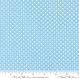 The image is a fabric with a repeating pattern of small white flowers or leaves. The pattern is evenly spaced and covers the entire fabric, creating a uniform and visually appealing design.