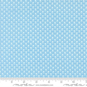 The image is a fabric with a repeating pattern of small white flowers or leaves. The pattern is evenly spaced and covers the entire fabric, creating a uniform and visually appealing design.