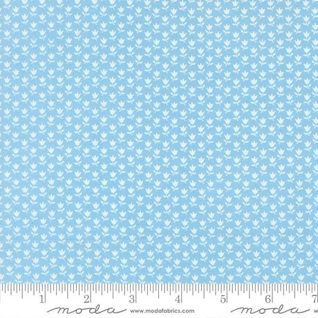 The image is a fabric with a repeating pattern of small white flowers or leaves. The pattern is evenly spaced and covers the entire fabric, creating a uniform and visually appealing design.